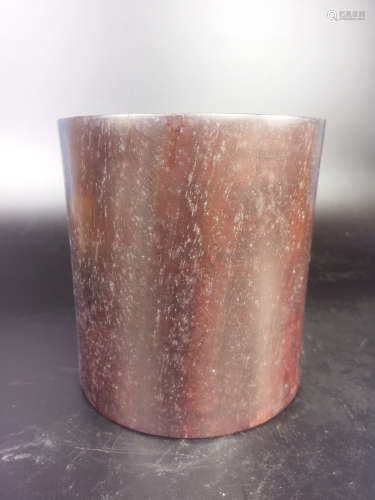 A RED WOOD BRUSH POT