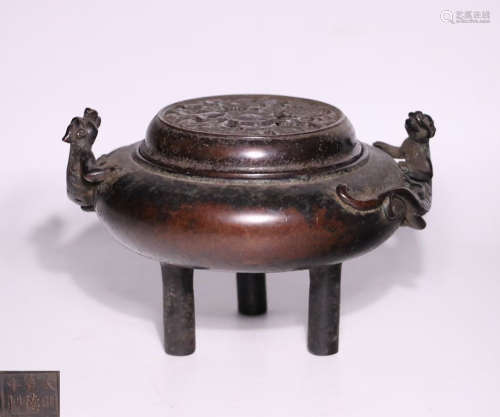 A COPPER THREE STEM FEET CENSER