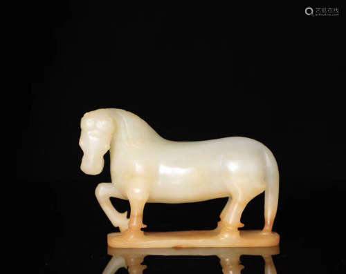 A HETIAN JADE CARVED HORSE SHAPED PENDANT