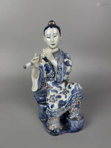 A BLUE AND WHITE MEN FIGURE