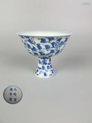 A BLUE AND WHITE STEM CUP