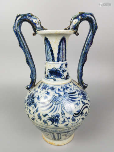 A BLUE AND WHITE DOUBLE DRAGON-HANDLES VASE