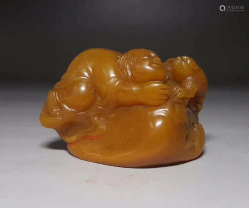 A TIANHUANG STONE CARVED FIGURE SEAL