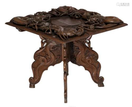 A colonial richly carved dragon decorated hardwood