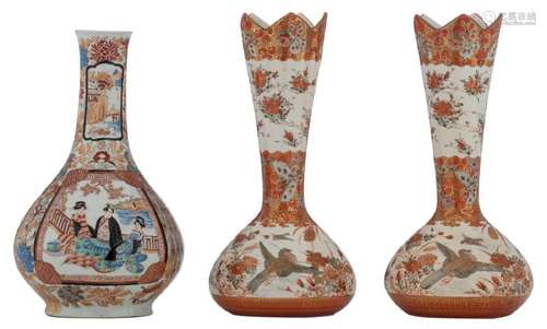 A pair of Japanese kutani bottle vases, the neck calyx