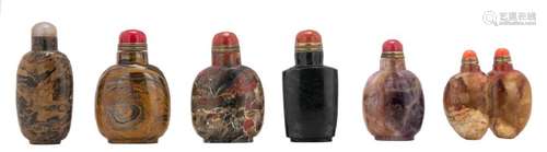 Five Chinese stone snuff bottles with semi precious