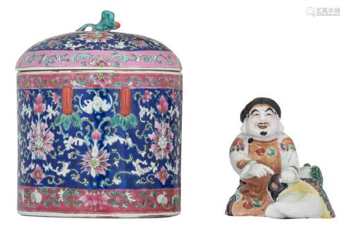 A Chinese blue ground famille rose pot and cover,