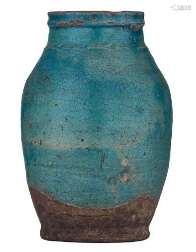 A turquoise glazed pottery jar (could be a Seljuk jar),