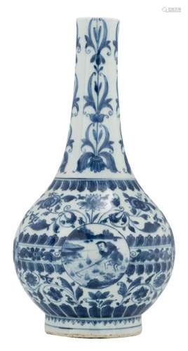 A Chinese blue and white floral decorated bottle vase,