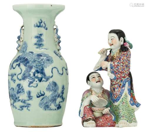 A Chinese celadon ground blue and white vase, decorated