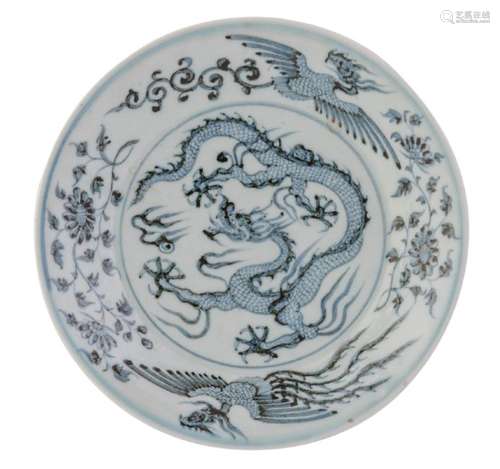 A Chinese blue and white footed plate, decorated with