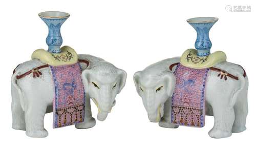 A pair of Chinese polychrome decorated elephant shaped