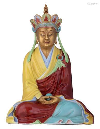 A Chinese polychrome and gilt decorated figure