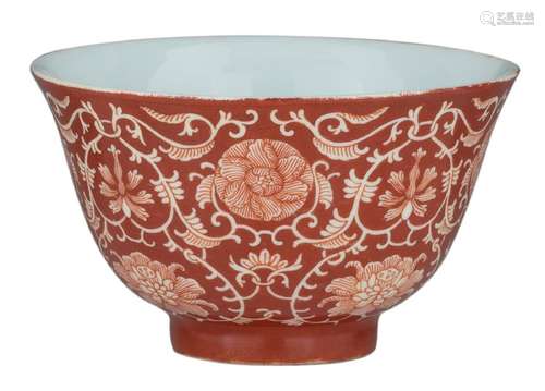 A Chinese iron red cup, decorated with scrolling lotus,