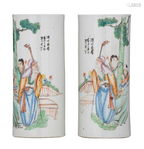 A pair of Chinese polychrome cylindrical vases,