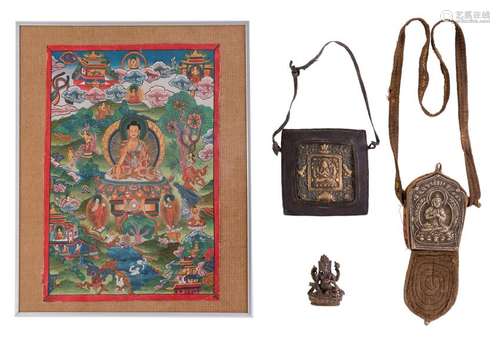 A Sino-Tibetan bronze amulet and a ditto paktong amulet;