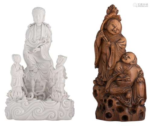 A Chinese blanc de chine group, depicting a Guanyin and