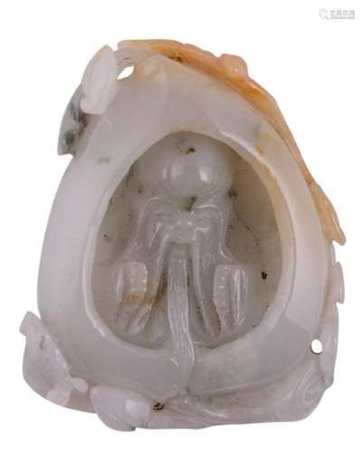 A small russet jade sculpture depicting Shou Xing