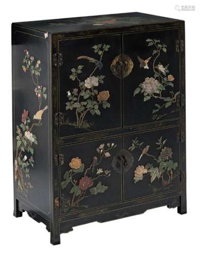 A Chinese black lacquered cupboard, with semi-precious