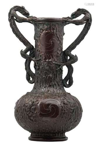 A Chinese bark relief decorated patinated bronze bottle