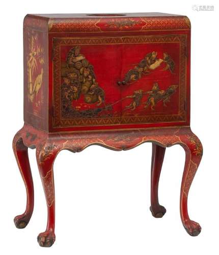 A gilt decorated red lacquered japaned cabinet on stand