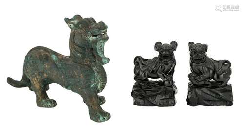 A Chinese bronze archaic mythical animal with taotie;