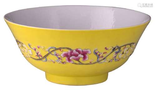 A Chinese orange peel yellow ground famille rose bowl,