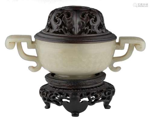 A Chinese carved jade incense burner with open work