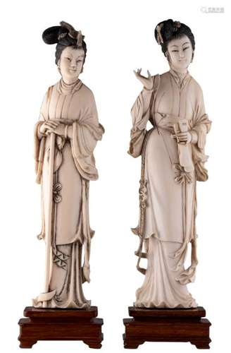 Two Chinese late Qing period finely cut ivory beauties,