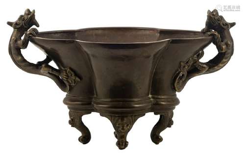 A Chinese four lobed bronze footed censer, the handles