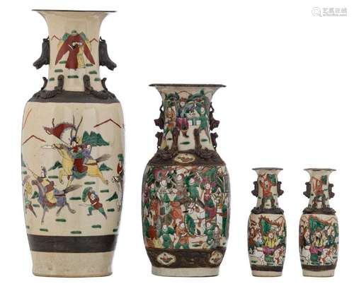 Three Chinese polychrome and relief decorated stoneware