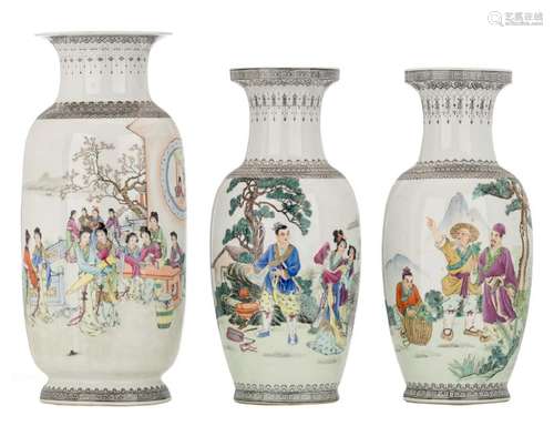 Three Chinese famille rose vases, decorated with an