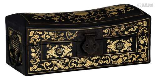 A Chinese black lacquered gilt decorated neck rest