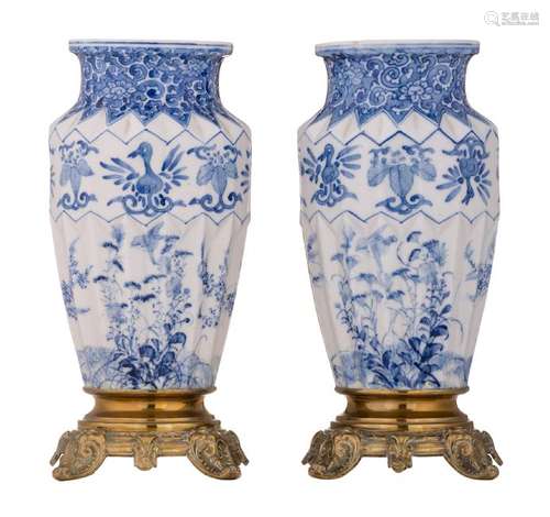 A pair of Japanese blue and white faceted vases,