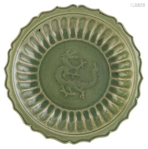 A Chinese Longquan celadon incised dragon charger, with