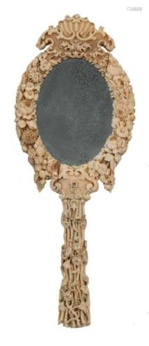 An very rare ivory ladies handmirror finely sculpted