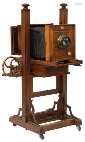 An oak and walnut studio camera, about 1910 - 1920,