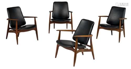 A set of four vintage teak framed armchairs,