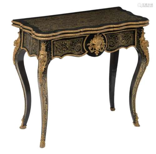 A 19th century French ebonised boule work card table