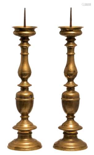 A pair of 17thC copper alloy pricket altar
