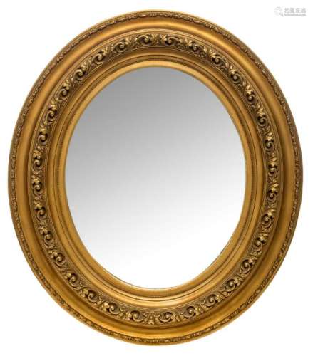 An oval mirror in gilt frame, 87 x 99,5 cm