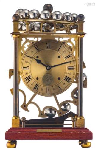 A Sinclair Harding and CÂ° brass mantle clock, the dial