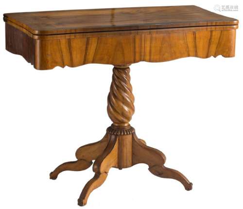 A probably German Biedermeier walnut folding table,