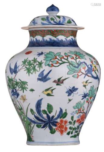 A polychrome Samson vase and cover, decorated with