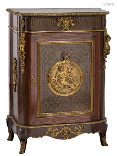 A Neoclassical veneered cabinet, richly decorated with
