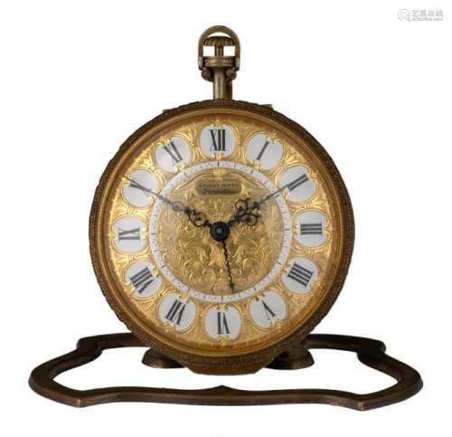 A pocket watch on stand, marked 'Ernest Borel -