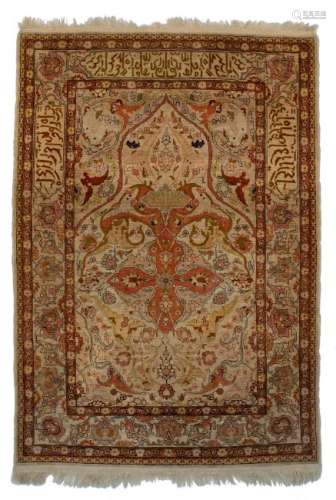 A fine Oriental prayer rug, decorated with stylised