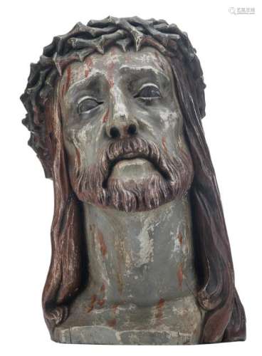 A 20thC polychrome painted oak sculpture depicting the