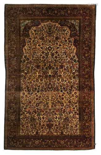 A fine Oriental silk rug, floral decorated with the