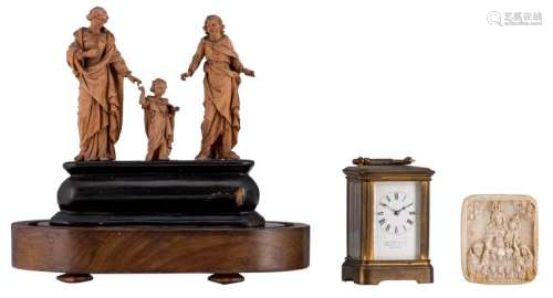 An 18th/19C wooden sculpted group depicting the Holy